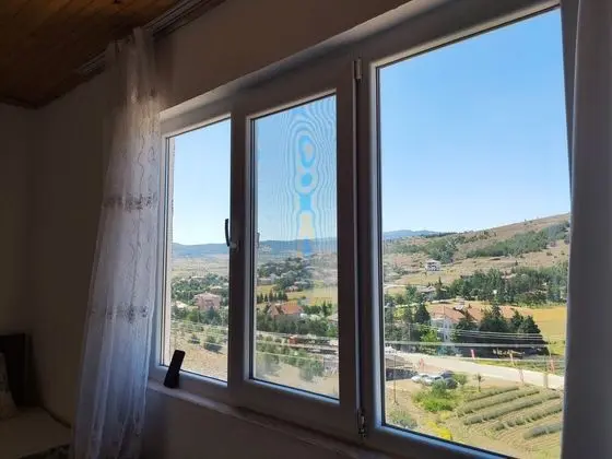 Balkonlu  dört  kişilik oda