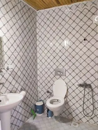 Balkonlu  dört  kişilik oda