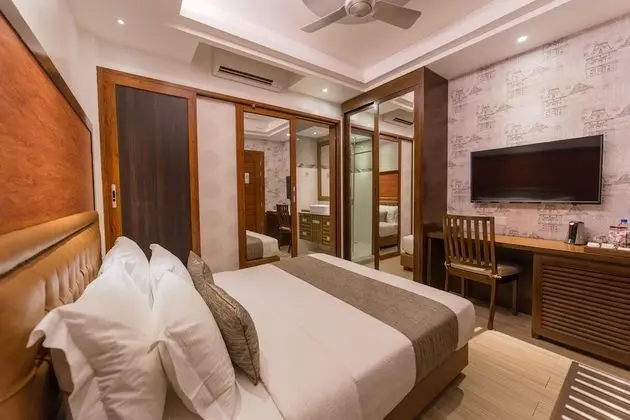 Super Deluxe Room with Balcony & Free Return Airport Transfer