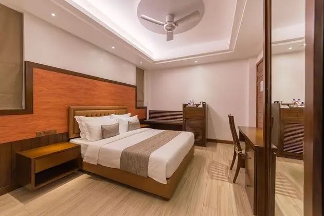 Super Deluxe Room with Balcony & Free Return Airport Transfer