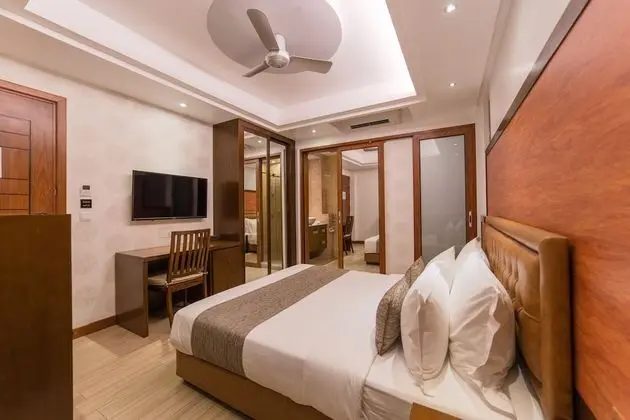 Super Deluxe Room with Balcony & Free Return Airport Transfer