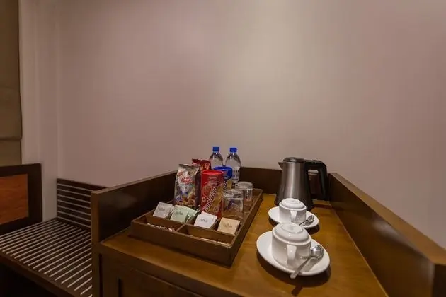 Super Deluxe Room with Balcony & Free Return Airport Transfer