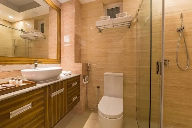 Super Deluxe Room with Balcony & Free Return Airport Transfer