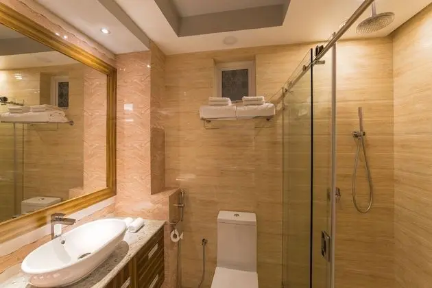 Super Deluxe Room with Balcony & Free Return Airport Transfer
