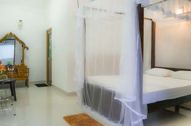 Üç Kişilik Oda, Bahçe Manzaralı