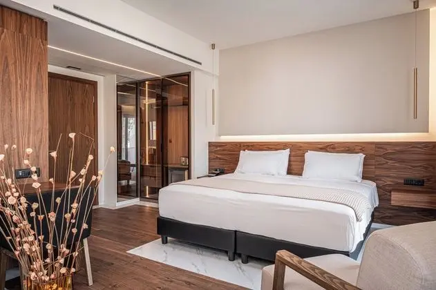 One Bedroom Junior Suite with Side Sea View