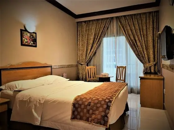 Deluxe Tek Büyük veya İki Ayrı Yataklı Oda