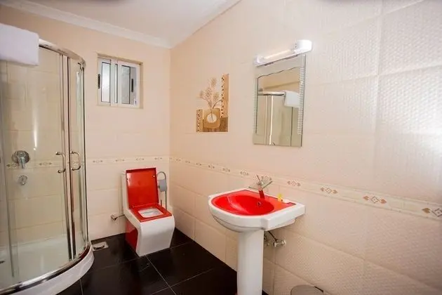 Deluxe Tek Büyük veya İki Ayrı Yataklı Oda