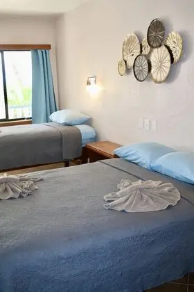 Deluxe Tek Büyük Yataklı Oda, Plaj Manzaralı, Denize Sıfır