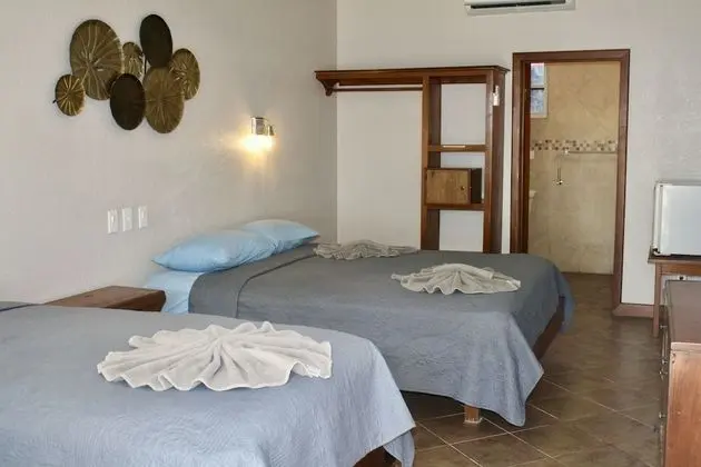 Deluxe Tek Büyük Yataklı Oda, Plaj Manzaralı, Denize Sıfır