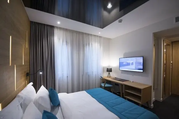 Deluxe Tek Büyük veya İki Ayrı Yataklı Oda