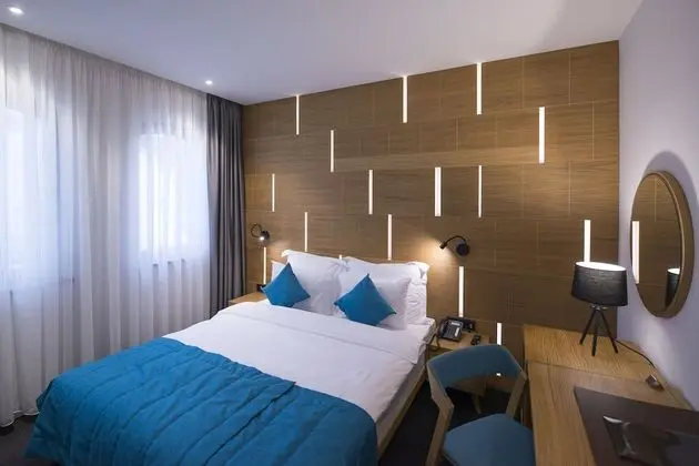 Deluxe Tek Büyük veya İki Ayrı Yataklı Oda