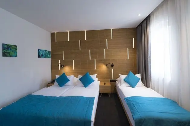 Deluxe Üç Kişilik Oda