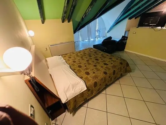 Deluxe Dört Kişilik Oda, Bahçe Manzaralı