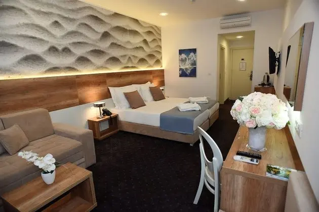 Deluxe Tek Büyük veya İki Ayrı Yataklı Oda