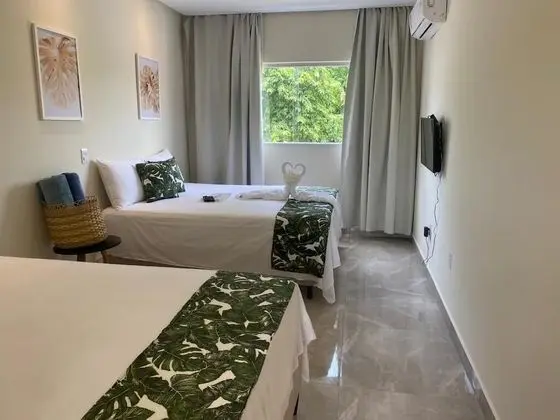 Deluxe Tek Büyük veya İki Ayrı Yataklı Oda