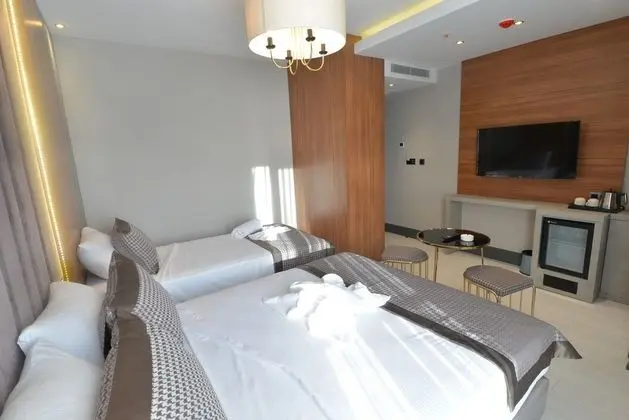 Üç Kişilik Oda