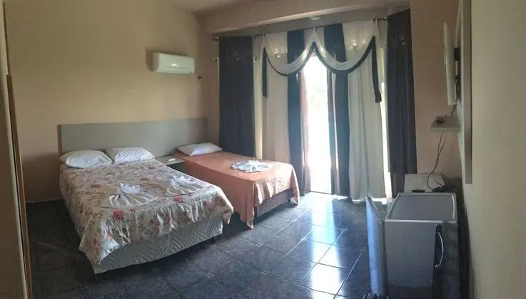 Üç Kişilik Oda