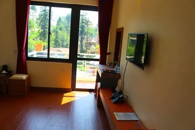 Deluxe Tek Büyük veya İki Ayrı Yataklı Oda