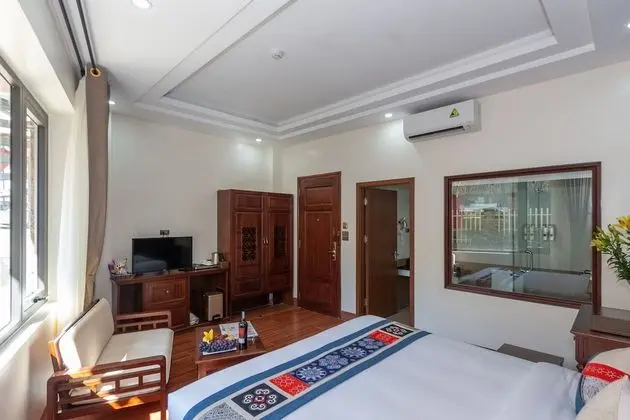 Deluxe Tek Büyük veya İki Ayrı Yataklı Oda