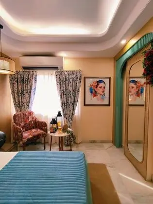 Bohemian Theme Room with Artistic Rattan decor & Designer Washroom