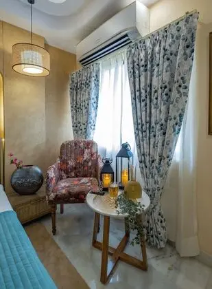 Bohemian Theme Room with Artistic Rattan decor & Designer Washroom