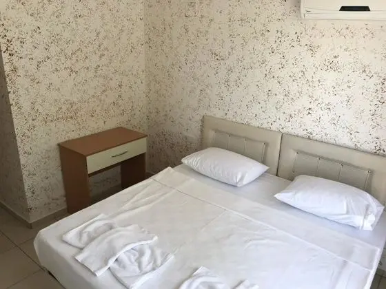 2 Tek Yataklı Oda
