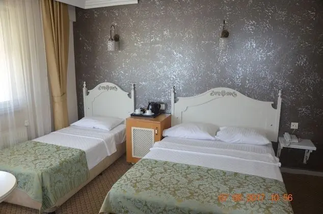 Üç Kişilik Oda