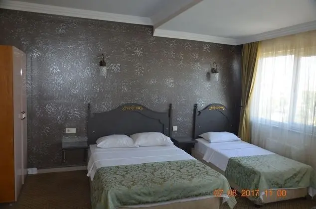 Üç Kişilik Oda