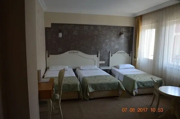 Üç Kişilik Oda