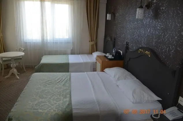 Üç Kişilik Oda