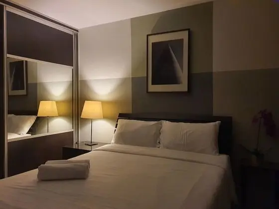 City Balcony Studio Apartment: Queen Bed + Sofa Bed + Working Desk