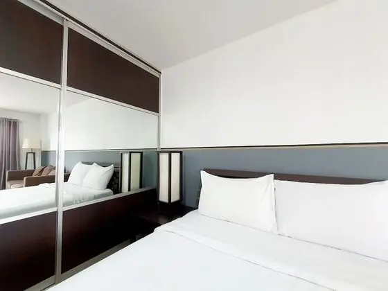 City Balcony Studio Apartment: Queen Bed + Sofa Bed + Working Desk