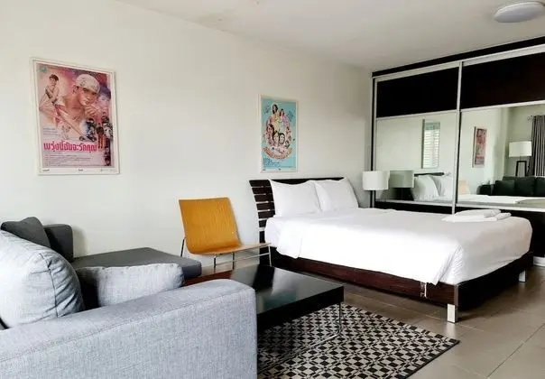 City Balcony Studio Apartment: Queen Bed + Sofa Bed + Working Desk