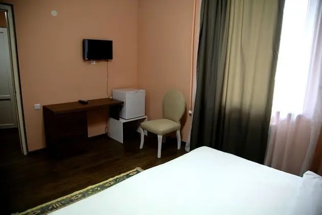 Basic Tek Büyük veya İki Ayrı Yataklı Oda