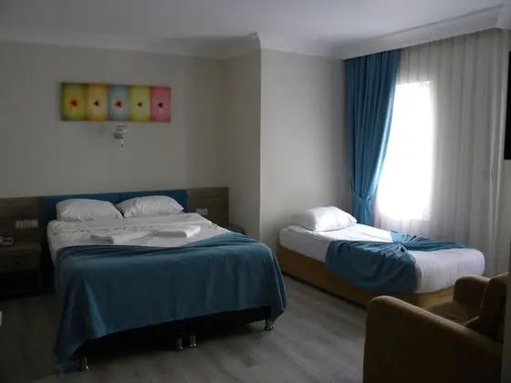 Üç Kişilik Oda