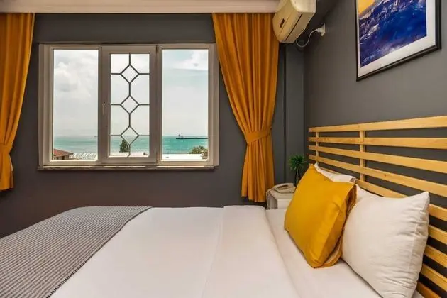 Deluxe Tek Büyük veya İki Ayrı Yataklı Oda, Deniz Manzaralı