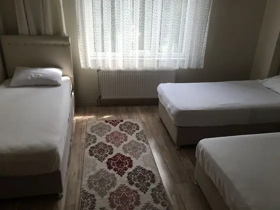 Üç Kişilik Oda
