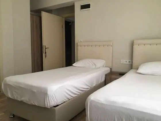 Üç Kişilik Oda