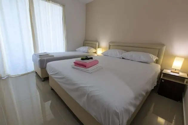 Deluxe Tek Büyük veya İki Ayrı Yataklı Oda