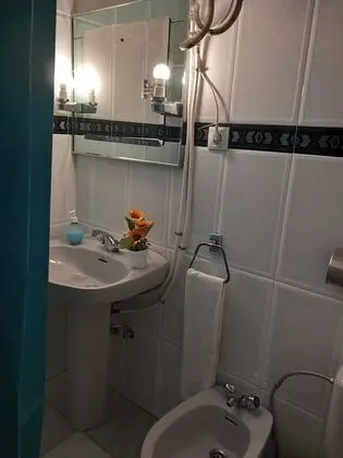 Basic Tek Büyük veya İki Ayrı Yataklı Oda