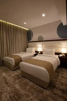 Deluxe Tek Büyük veya İki Ayrı Yataklı Oda