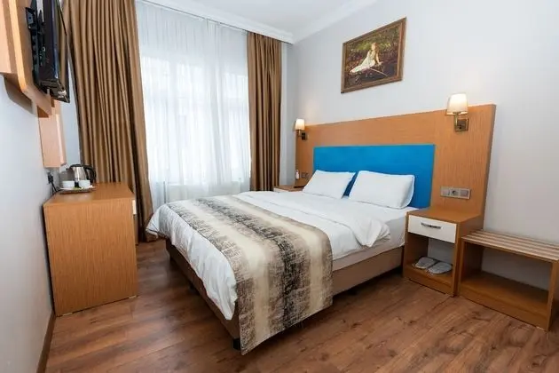City Tek Büyük Yataklı Oda