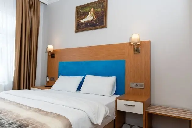 City Tek Büyük Yataklı Oda