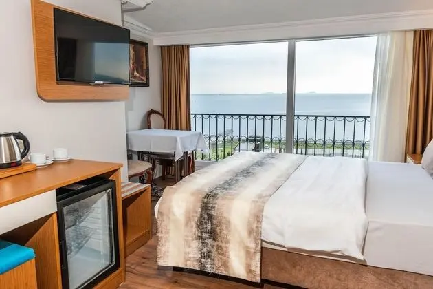 Deluxe Tek Büyük Yataklı Oda, Balkon, Deniz Manzaralı