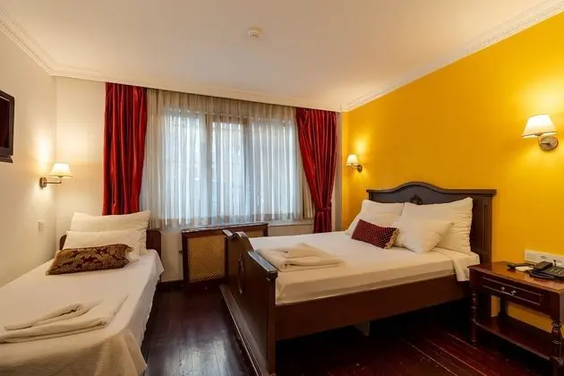 Üç Kişilik Oda