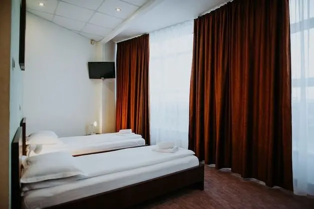 Comfort Tek Büyük veya İki Ayrı Yataklı Oda
