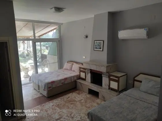 Daire-Zemin Kat,Bahçe Manzaralı,Balkonlu