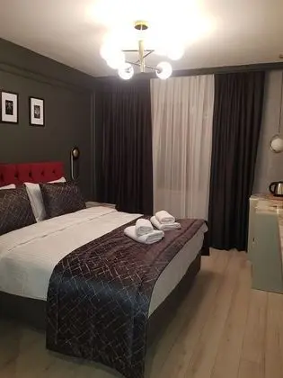 Deluxe Tek Büyük veya İki Ayrı Yataklı Oda