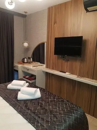 Deluxe Tek Büyük veya İki Ayrı Yataklı Oda